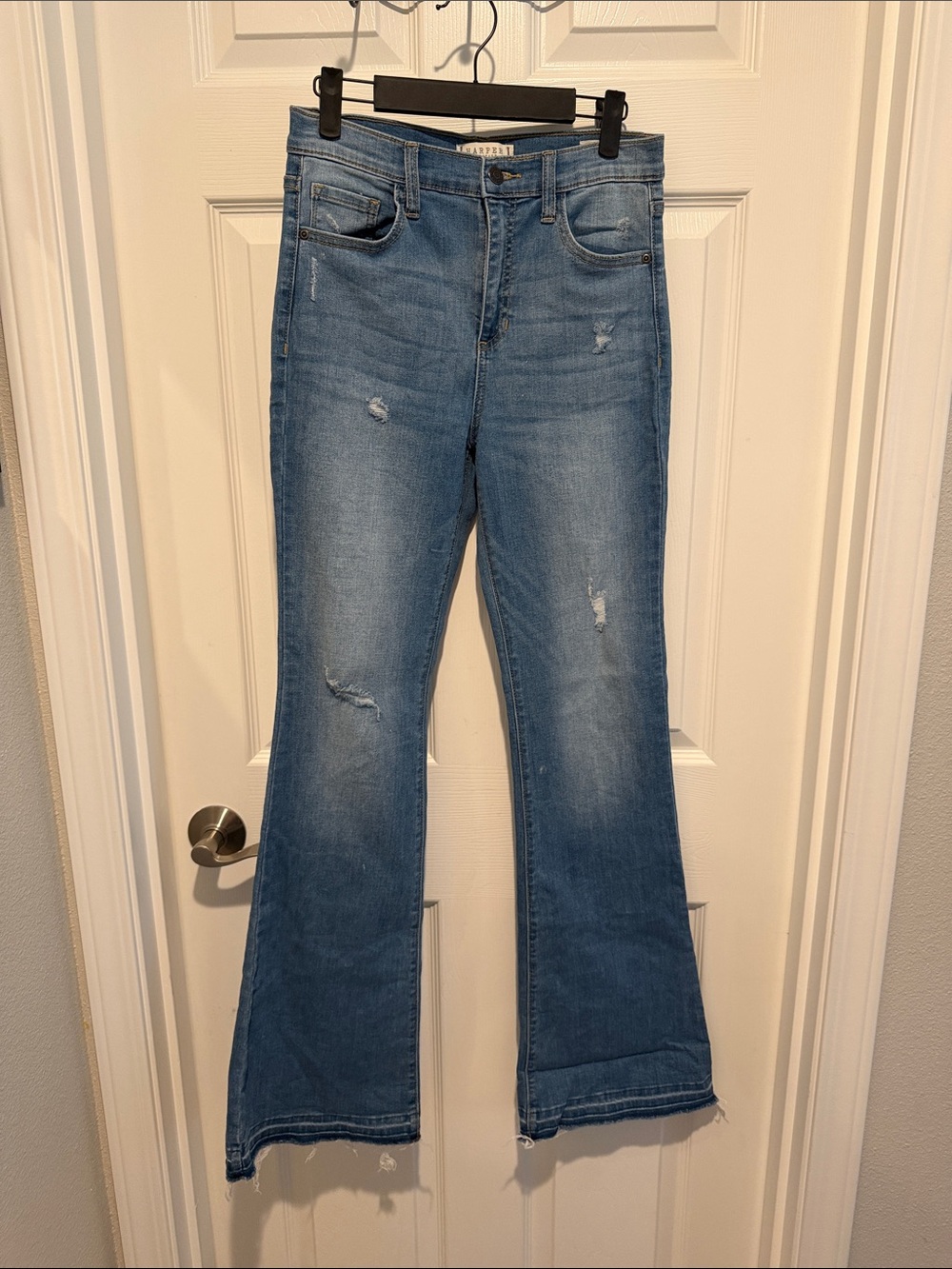 Women’s Light Wash Distressed Flare Jeans